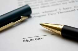 to-sign-a-contract-3-1236622-1599x1066